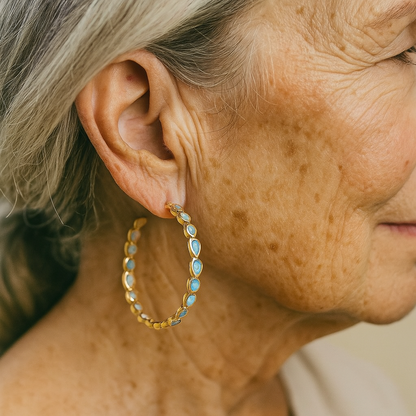 Retro oorbellen met blauw opaal in goud