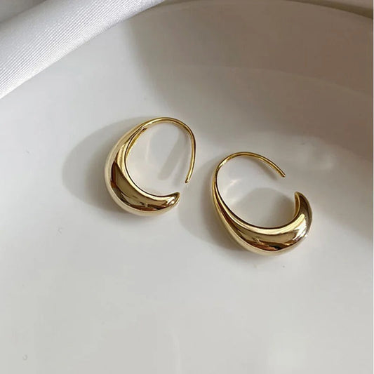 Glinsterende retro halvemaanoorbellen | Goud