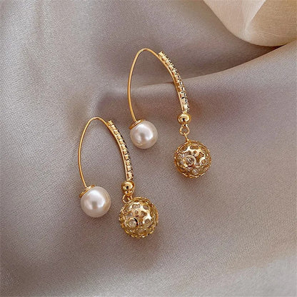 Retro oorbellen met madeliefjes in goud