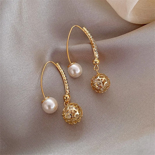 Retro oorbellen met madeliefjes in goud