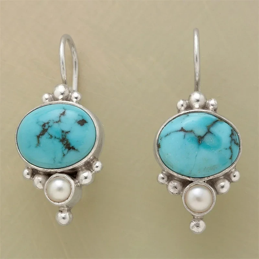 Vintage oorbellen met blauwe steen en madeliefjes | Goud
