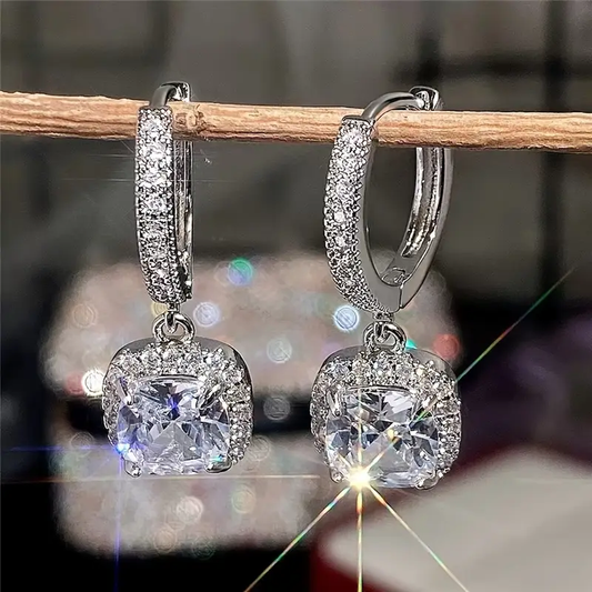 Vintage oorbellen met glinsterende stenen | Witgoud