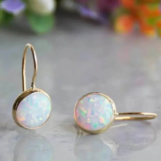 Vintage oorbellen met opaalsteen | Goud