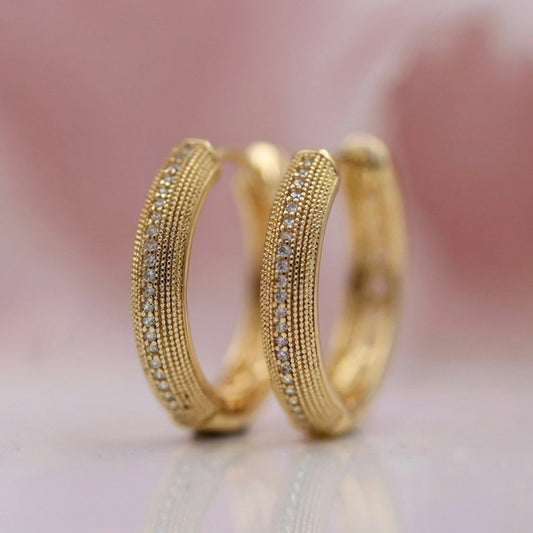 Vintage oorbellen met elegant design in goud