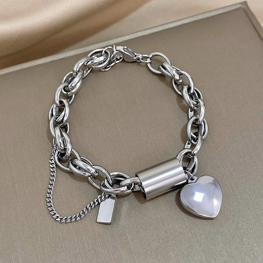 Revitaliserende dikke schakelarmband in wit goud