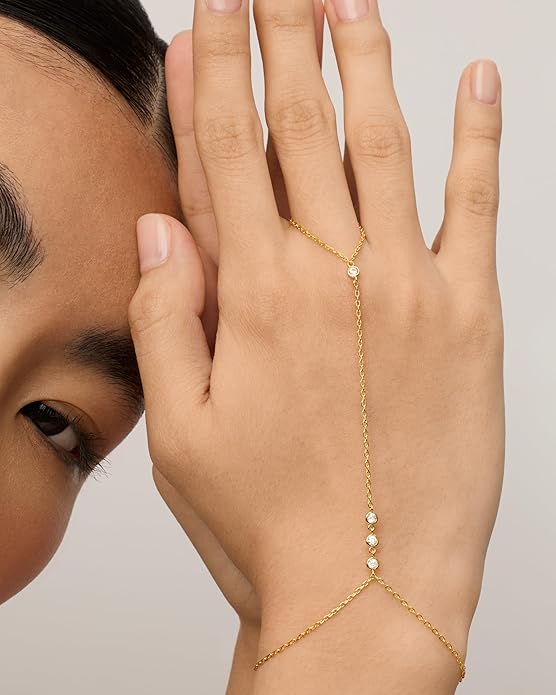 Schakelarmband met parels in goud
