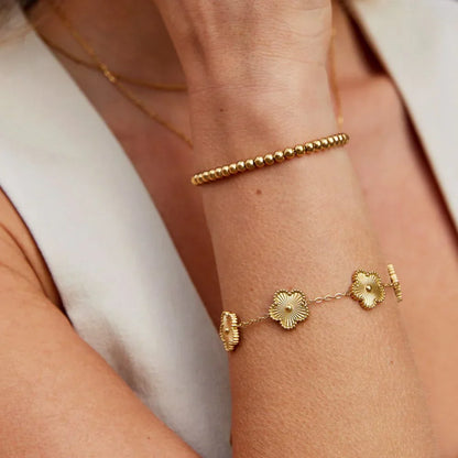 Bedelarmband Florielle Bloom in goud