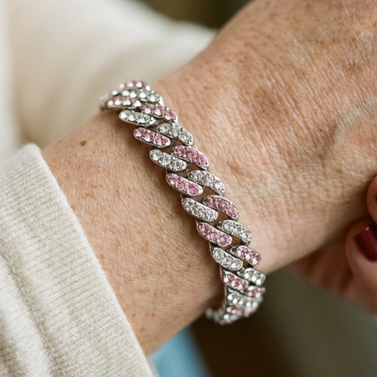 IJzige roze schakelarmband in wit goud