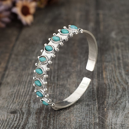 Turquoise bangle Azmira in wit goud