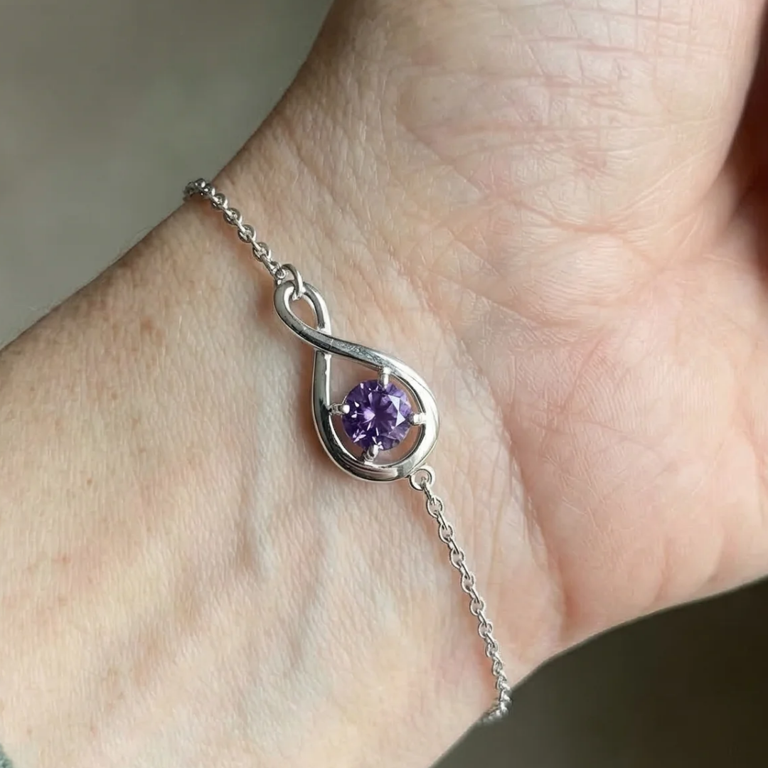 Amethist infinity-armband in wit goud
