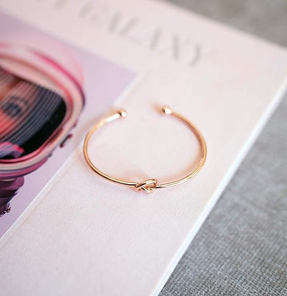 Infinity-armband Liefdesknoop in goud