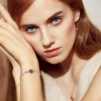 Robijn infinity-armband in wit goud