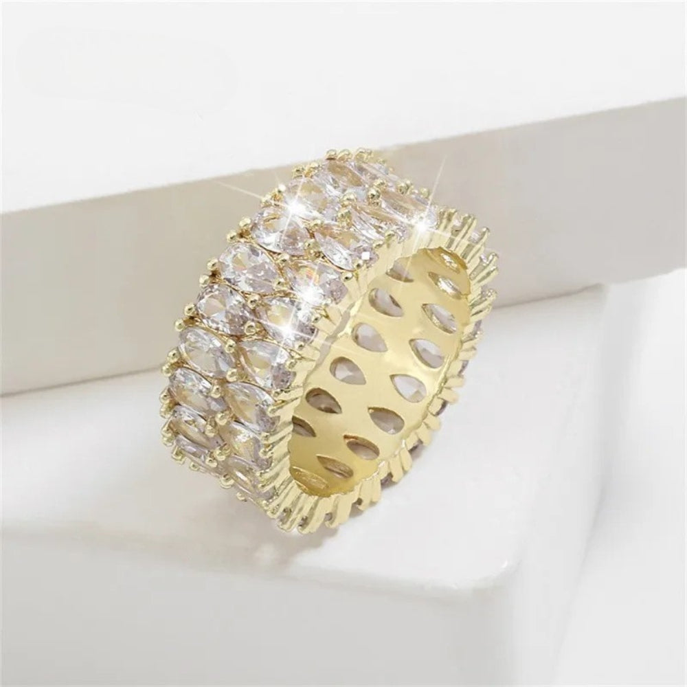 Brede oosterse kristallen armband in goud