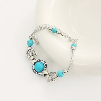 Armband Oasis Vlindervlucht in wit goud