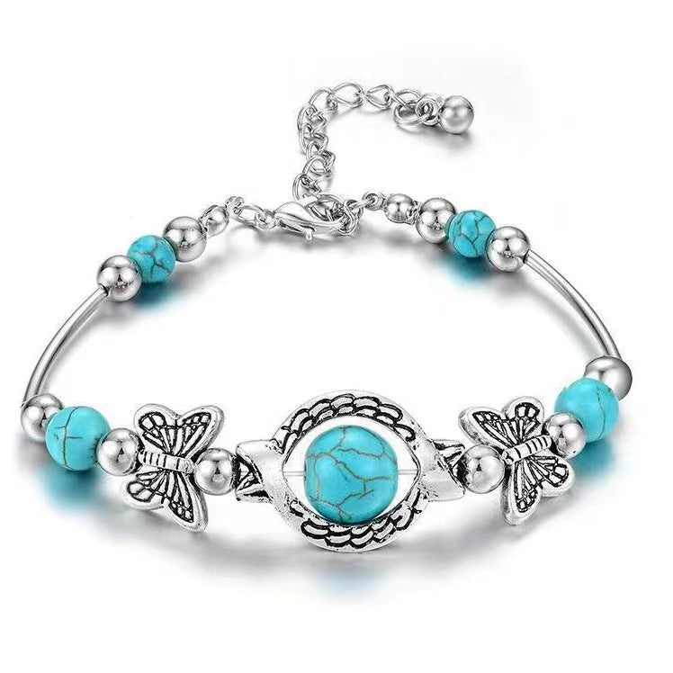 Armband Oasis Vlindervlucht in wit goud
