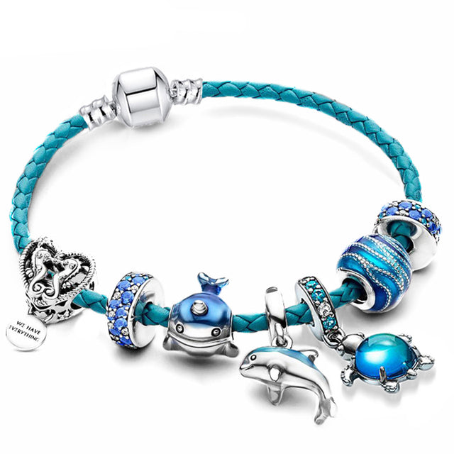 Oceaanarmband met leren bedels in wit goud
