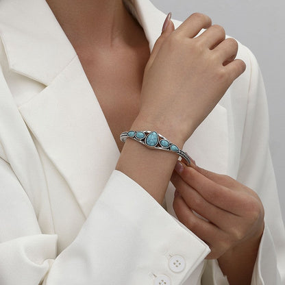 Open armband met turquoise druppel | Witgoud