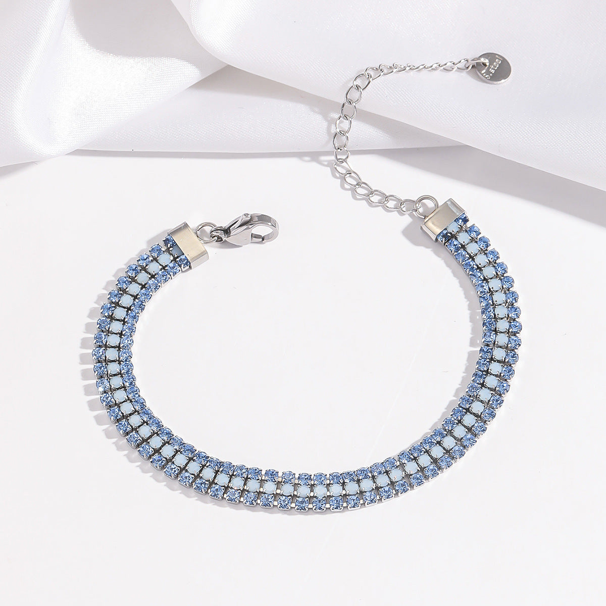 Stralende signature-armband in wit goud
