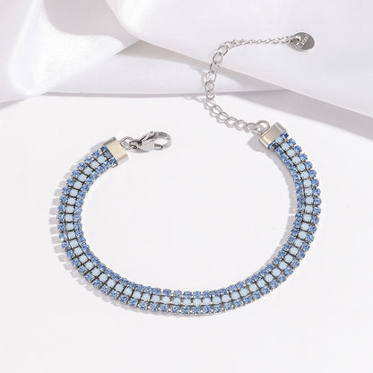 Stralende signature-armband in wit goud