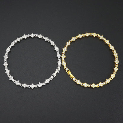 Klassieke tennisarmband met clusters in goud