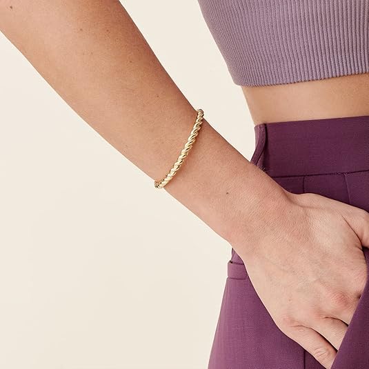 Gedraaide armband in goud