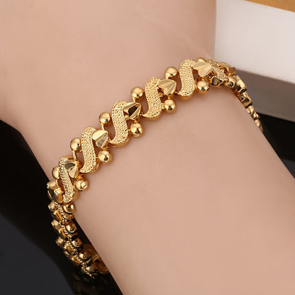 Golvende lelie-armband in goud