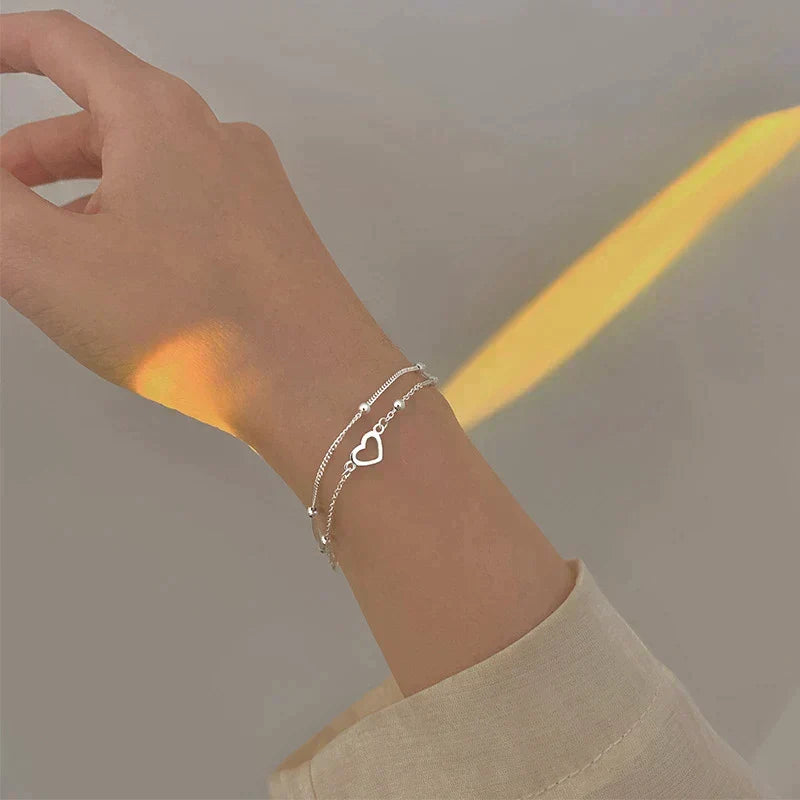 Verstelbare armband met hart in wit goud