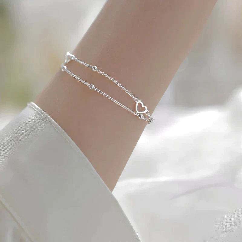 Verstelbare armband met hart in wit goud