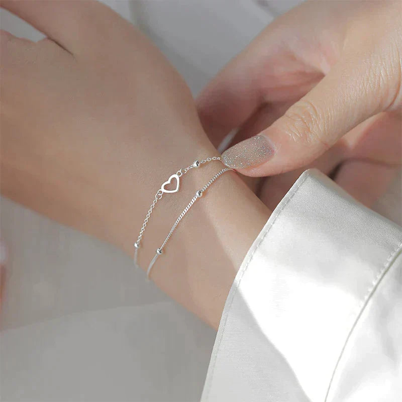 Verstelbare armband met hart in wit goud