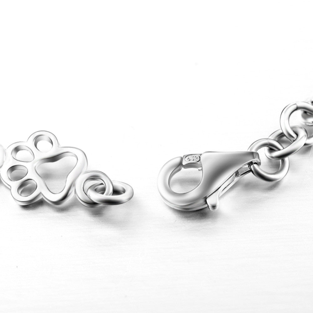 Armband met hondenpootjes en botje, gelimiteerde oplage | Witgoud