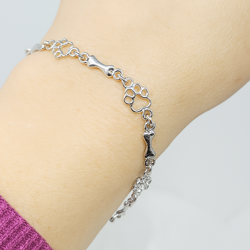 Armband met hondenpootjes en botje, gelimiteerde oplage | Witgoud