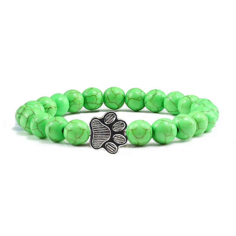 Armband met pootjeskralen van natuursteen | Goud