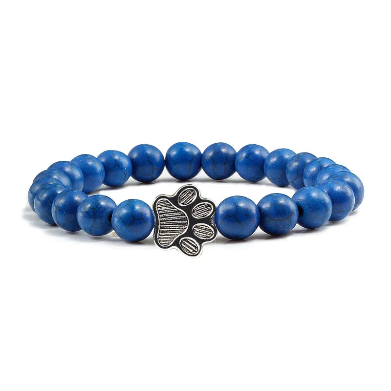 Armband met pootjeskralen van natuursteen | Goud
