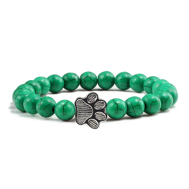 Armband met pootjeskralen van natuursteen | Goud