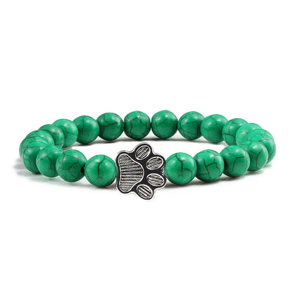 Armband met pootjeskralen van natuursteen | Goud