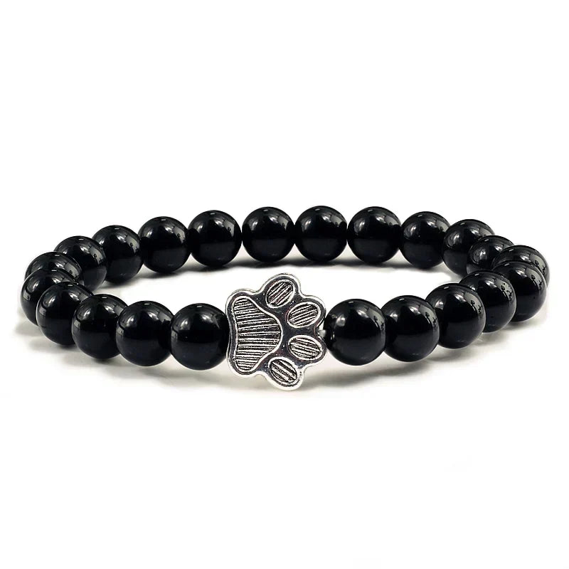 Armband met pootjeskralen van natuursteen | Goud