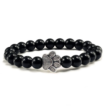 Armband met pootjeskralen van natuursteen | Goud