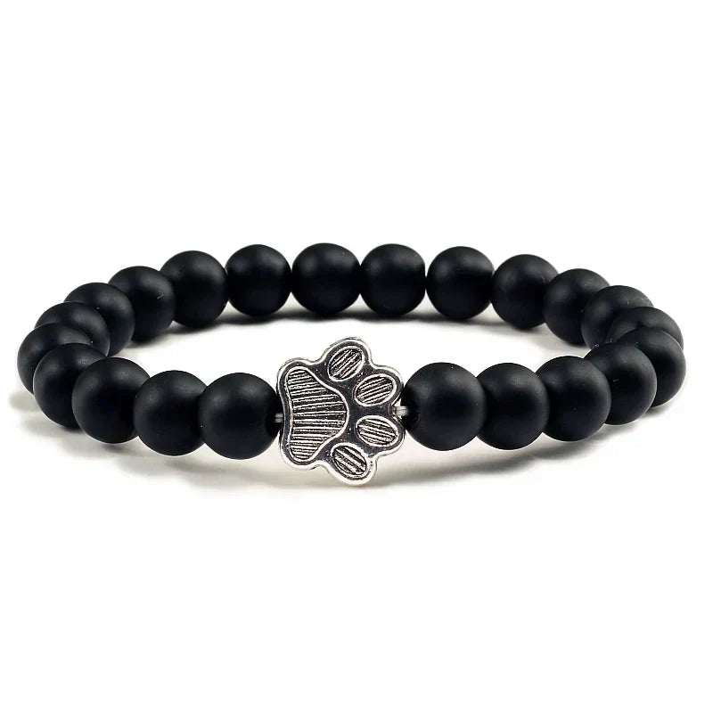Armband met pootjeskralen van natuursteen | Goud