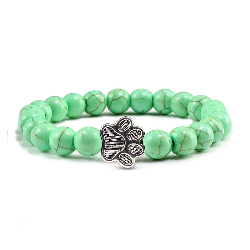Armband met pootjeskralen van natuursteen | Goud