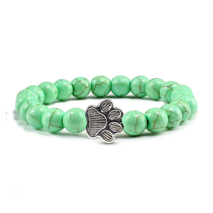 Armband met pootjeskralen van natuursteen | Goud