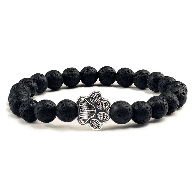 Armband met pootjeskralen van natuursteen | Goud