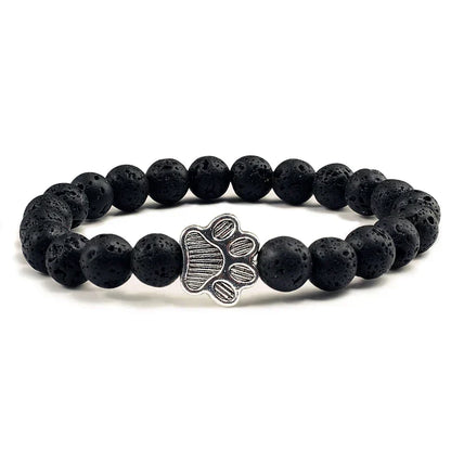 Armband met pootjeskralen van natuursteen | Goud
