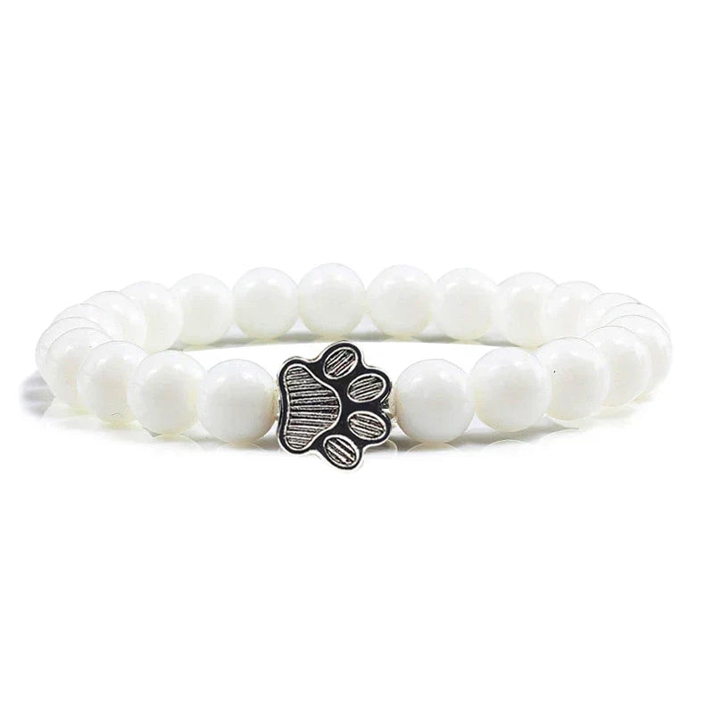 Armband met pootjeskralen van natuursteen | Goud