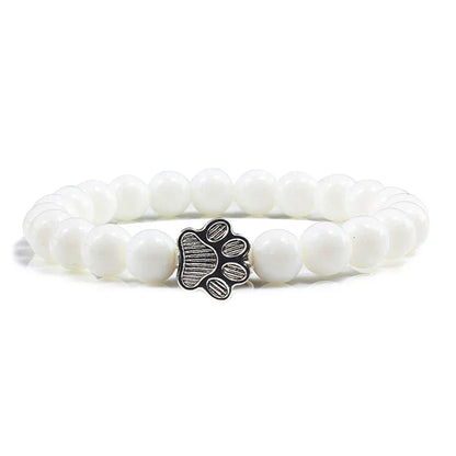 Armband met pootjeskralen van natuursteen | Goud