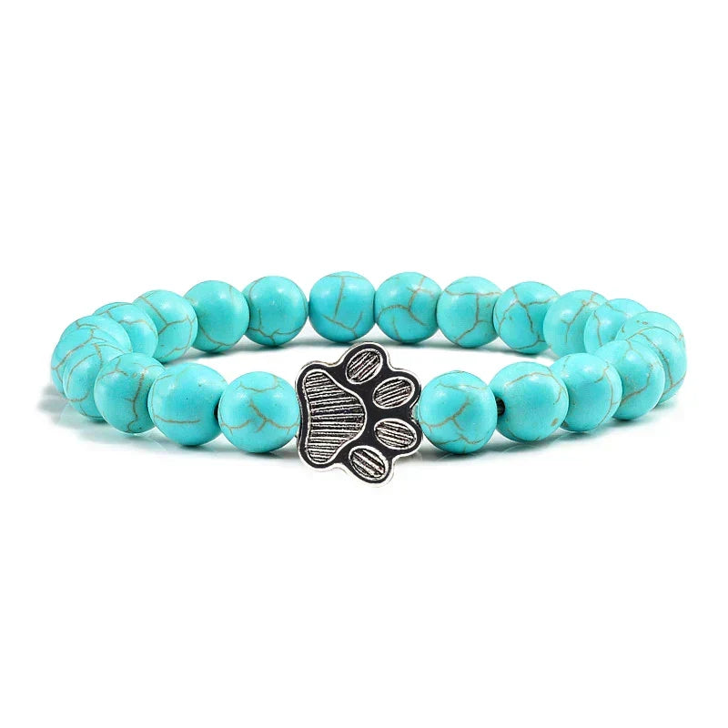 Armband met pootjeskralen van natuursteen | Goud