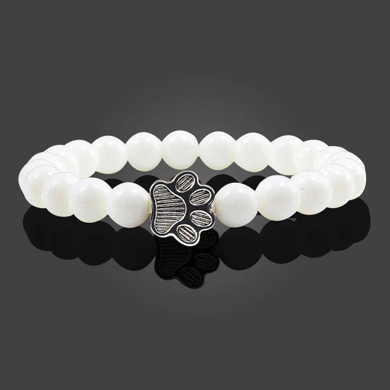 Armband met pootjeskralen van natuursteen | Goud