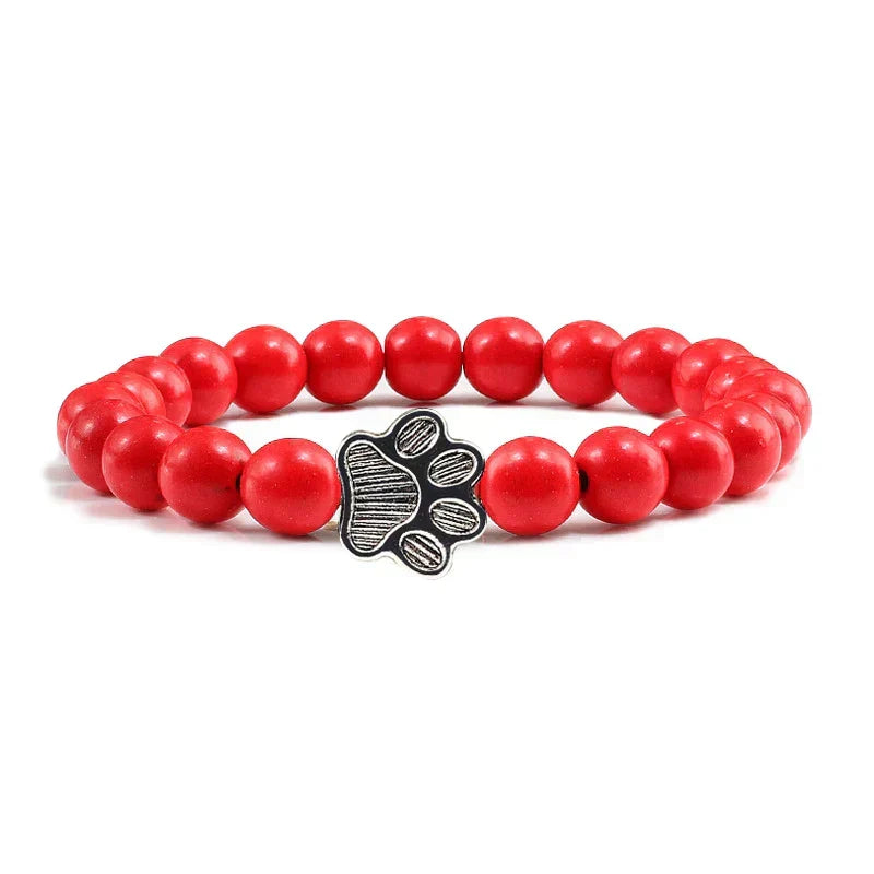 Armband met pootjeskralen van natuursteen | Goud