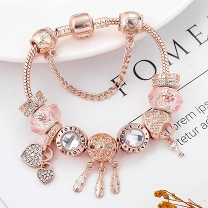 Roze dromenvangerarmband met bedels in wit goud