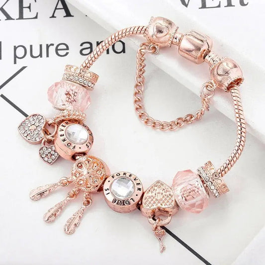 Roze dromenvangerarmband met bedels | Witgoud