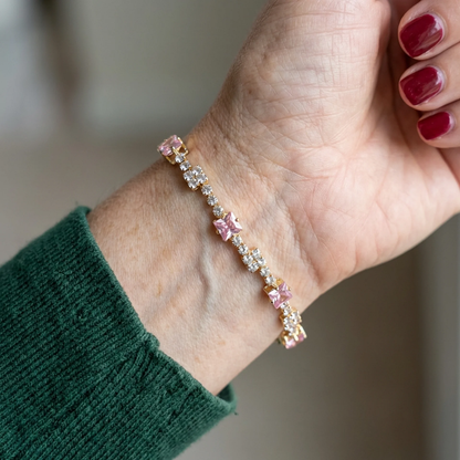 Roze tennisarmband met vierkante stenen in goud